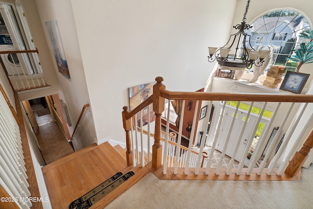 15 Savannah Dr, Barnegat, NJ 08005 - stairway featuring carpet flooring and a chandelier