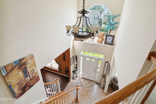 15 Savannah Dr, Barnegat, NJ 08005 - entrance foyer featuring a towering ceiling, stairs, a chandelier, and tile patterned flooring