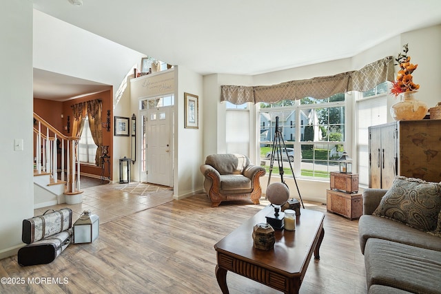 15 Savannah Dr, Barnegat, NJ 08005 - living area with plenty of natural light, stairs, and wood finished floors