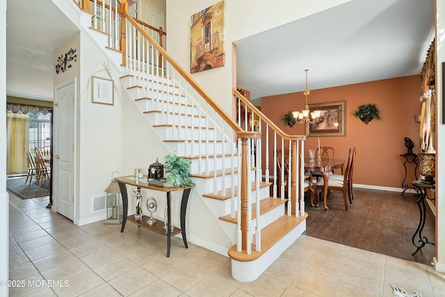 15 Savannah Dr, Barnegat, NJ 08005 - stairway with a chandelier and tile patterned flooring