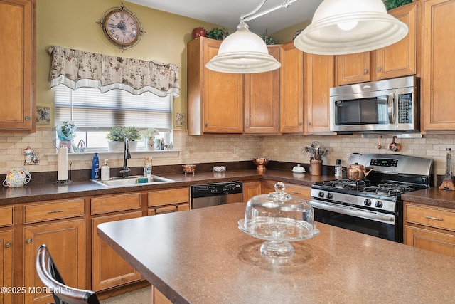 15 Savannah Dr, Barnegat, NJ 08005 - kitchen with stainless steel appliances, dark countertops, brown cabinetry, and decorative backsplash