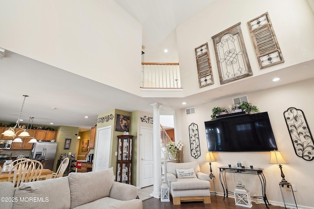 15 Savannah Dr, Barnegat, NJ 08005 - living area with ornate columns, a high ceiling, recessed lighting, and stairway