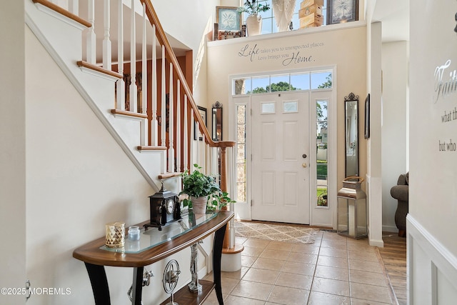 15 Savannah Dr, Barnegat, NJ 08005 - foyer entrance with plenty of natural light, a high ceiling, stairs, and light tile patterned flooring