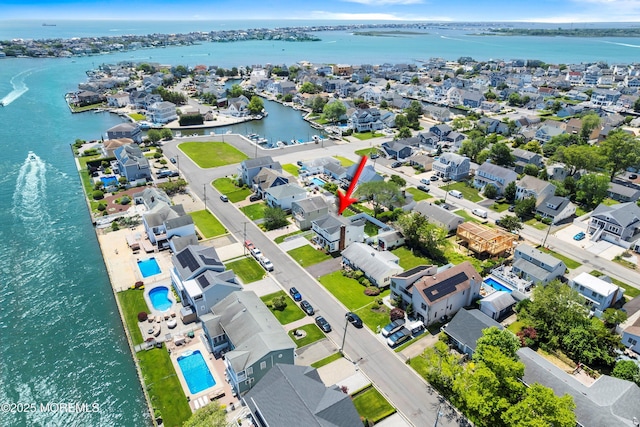 1810 Shore Blvd, Point Pleasant, NJ 08742 - aerial view of residential area with a large body of water and a pool area