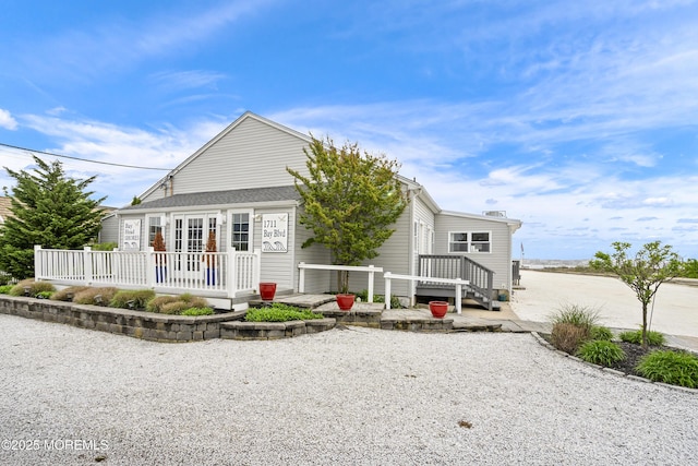 1810 Shore Blvd, Point Pleasant, NJ 08742 - view of front of property with a wooden deck and a patio