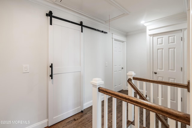 1810 Shore Blvd, Point Pleasant, NJ 08742 - hall with attic access, an upstairs landing, wood finished floors, ornamental molding, and a barn door