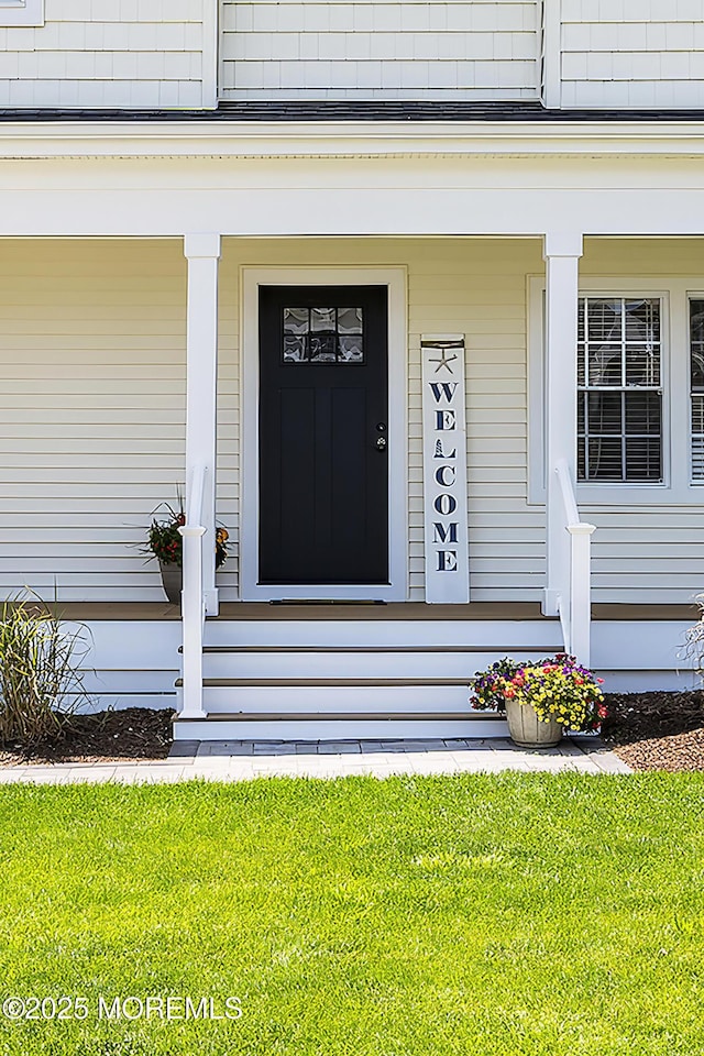 1810 Shore Blvd, Point Pleasant, NJ 08742 - view of exterior entry featuring a porch