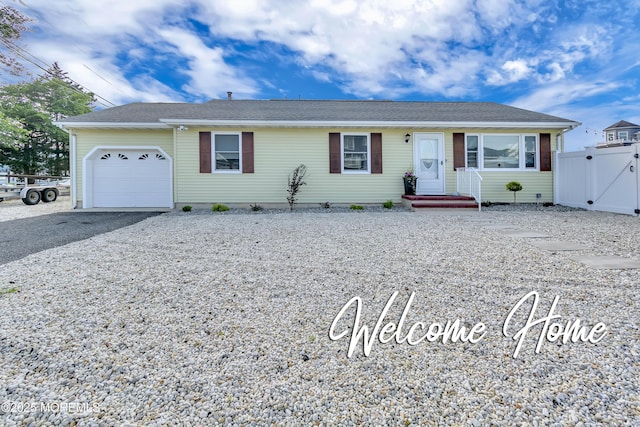 4 Longpoint Dr, Brick, NJ 08723 - single story home with a garage, driveway, and a gate