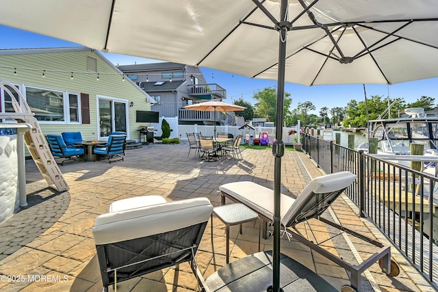 4 Longpoint Dr, Brick, NJ 08723 - fenced backyard with outdoor dining space and a patio area