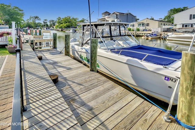 4 Longpoint Dr, Brick, NJ 08723 - dock area featuring a water view and a residential view