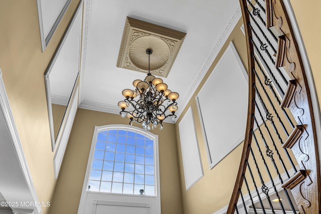 1 Ethan Dr, Farmingdale, NJ 07727 - detailed view of a chandelier and ornamental molding
