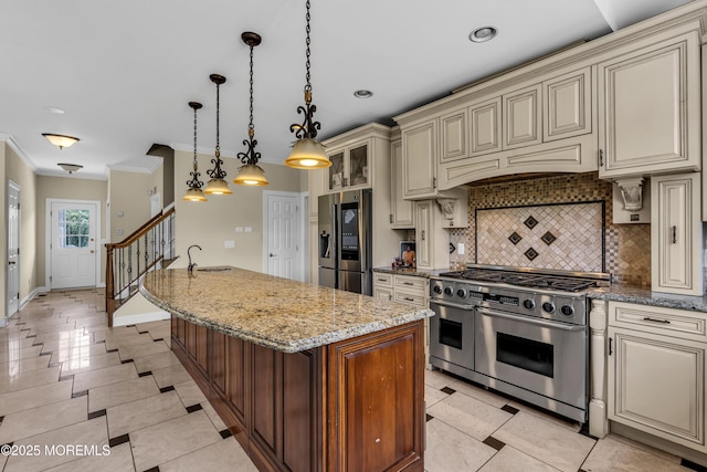 1 Ethan Dr, Farmingdale, NJ 07727 - kitchen with cream cabinetry, appliances with stainless steel finishes, decorative backsplash, ornamental molding, and light stone countertops