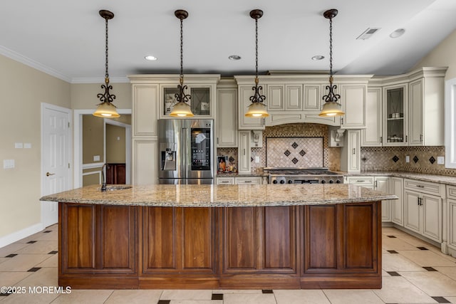 1 Ethan Dr, Farmingdale, NJ 07727 - kitchen featuring stainless steel fridge with ice dispenser, cream cabinetry, a spacious island, backsplash, and recessed lighting