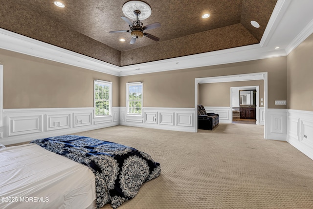 1 Ethan Dr, Farmingdale, NJ 07727 - carpeted bedroom featuring a tray ceiling, crown molding, recessed lighting, a decorative wall, and wainscoting
