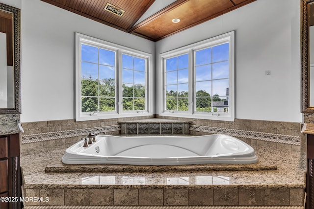 1 Ethan Dr, Farmingdale, NJ 07727 - bathroom with plenty of natural light, vanity, a whirlpool tub, vaulted ceiling, and wood ceiling