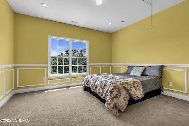 1 Ethan Dr, Farmingdale, NJ 07727 - carpeted bedroom with a decorative wall, a wainscoted wall, attic access, and recessed lighting
