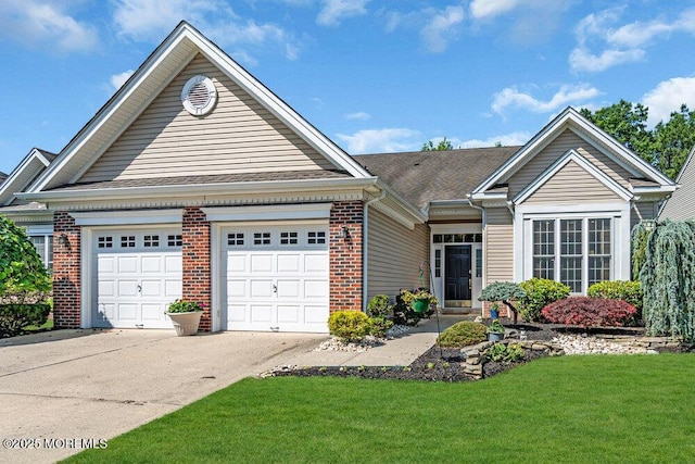 24 Oakmont Ln, Jackson, NJ 08527 - single story home featuring concrete driveway, brick siding, a front lawn, and a garage