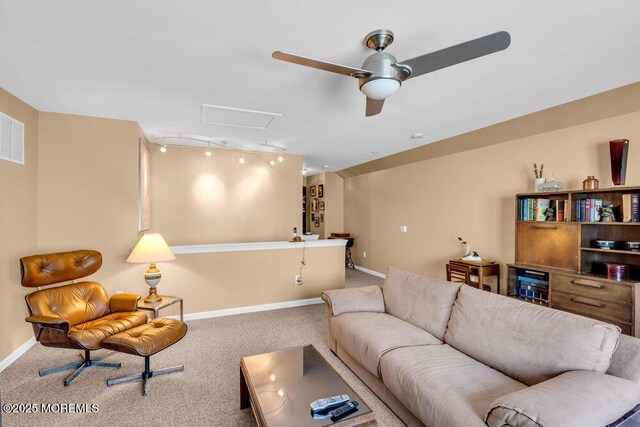 24 Oakmont Ln, Jackson, NJ 08527 - carpeted living room with a ceiling fan and attic access