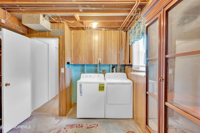 353 Cokes Dr, Toms River, NJ 08753 - laundry area with washer and dryer and wood walls