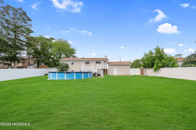 353 Cokes Dr, Toms River, NJ 08753 - back of house with a fenced backyard, a wooden deck, and stairs