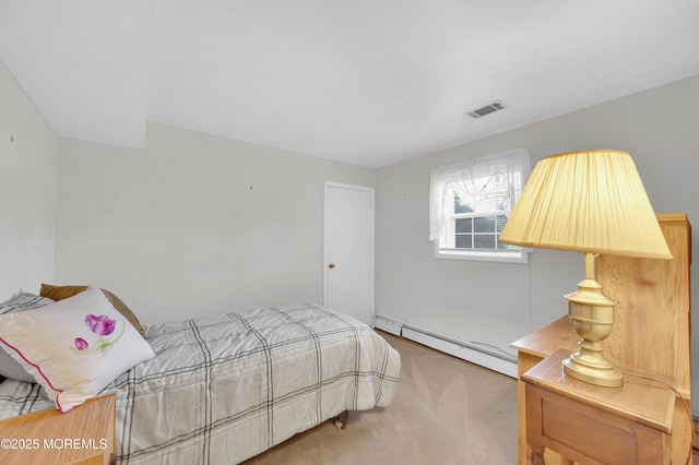 353 Cokes Dr, Toms River, NJ 08753 - bedroom featuring baseboard heating and carpet