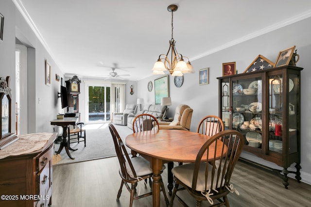 10 Ann Ct, Tinton Falls, NJ 07724 - dining space with wood finished floors, a ceiling fan, and crown molding
