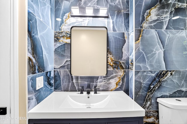 179A Buckelew Ave Unit A, Jamesburg, NJ 08831 - half bathroom featuring tile walls, vanity, and decorative backsplash