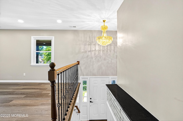 179A Buckelew Ave Unit A, Jamesburg, NJ 08831 - stairs with wood finished floors, a chandelier, and recessed lighting