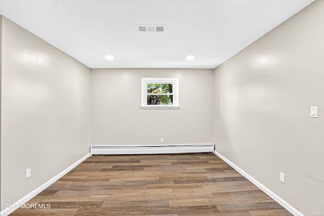 179A Buckelew Ave Unit A, Jamesburg, NJ 08831 - unfurnished room featuring baseboard heating, wood finished floors, and recessed lighting