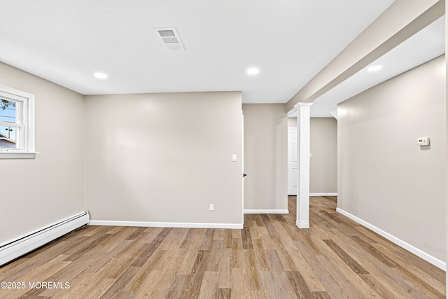 179A Buckelew Ave Unit A, Jamesburg, NJ 08831 - basement featuring a baseboard heating unit, light wood finished floors, and recessed lighting