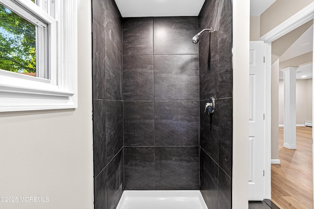 179A Buckelew Ave Unit A, Jamesburg, NJ 08831 - bathroom featuring tiled shower, wood finished floors, decorative columns, baseboard heating, and recessed lighting