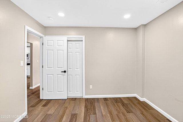 179A Buckelew Ave Unit A, Jamesburg, NJ 08831 - unfurnished bedroom with wood finished floors, recessed lighting, and a closet