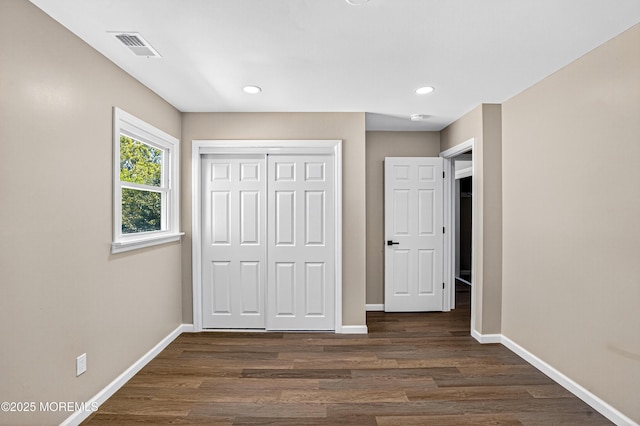 179A Buckelew Ave Unit A, Jamesburg, NJ 08831 - unfurnished bedroom featuring dark wood-style floors, a closet, and recessed lighting
