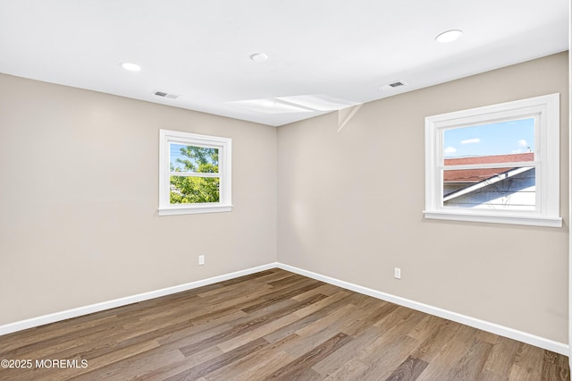 179A Buckelew Ave Unit A, Jamesburg, NJ 08831 - spare room with wood finished floors and recessed lighting