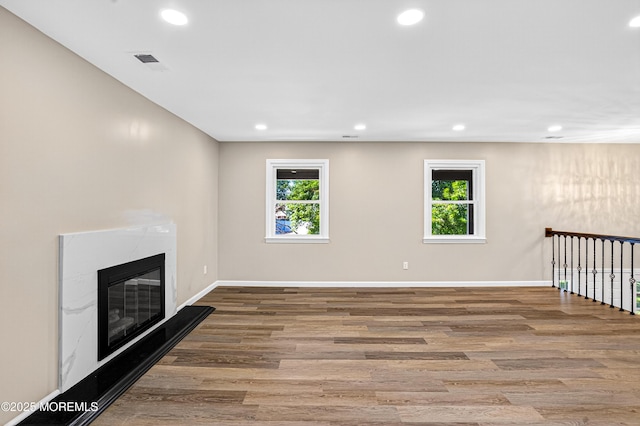 179A Buckelew Ave Unit A, Jamesburg, NJ 08831 - unfurnished living room featuring recessed lighting, wood finished floors, and a fireplace