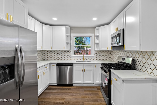 179A Buckelew Ave Unit A, Jamesburg, NJ 08831 - kitchen with appliances with stainless steel finishes, open shelves, white cabinets, light stone counters, and recessed lighting