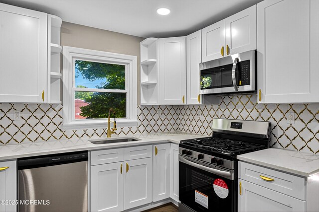 179A Buckelew Ave Unit A, Jamesburg, NJ 08831 - kitchen with open shelves, stainless steel appliances, white cabinetry, light stone counters, and recessed lighting
