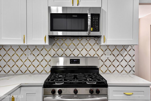 179A Buckelew Ave Unit A, Jamesburg, NJ 08831 - kitchen with stainless steel appliances, tasteful backsplash, white cabinets, and light stone counters