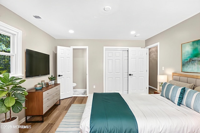 179A Buckelew Ave Unit A, Jamesburg, NJ 08831 - bedroom with wood finished floors, ensuite bath, and recessed lighting