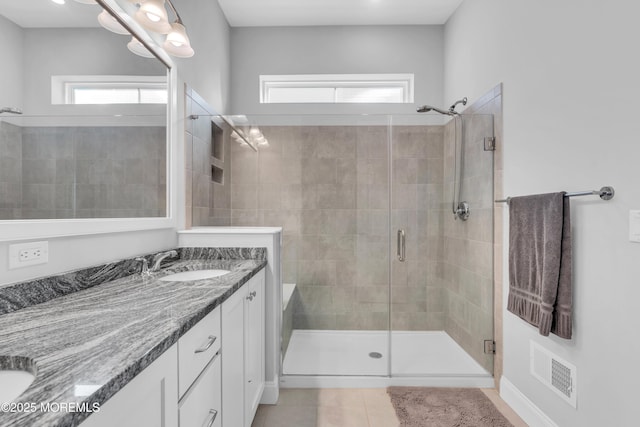65 Ambermist Way, Forked River, NJ 08731 - full bathroom with healthy amount of natural light, double vanity, and a stall shower