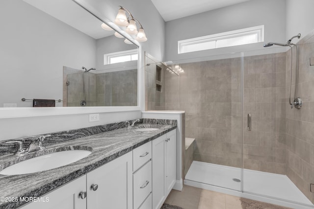 65 Ambermist Way, Forked River, NJ 08731 - bathroom featuring a stall shower, double vanity, and tile patterned floors