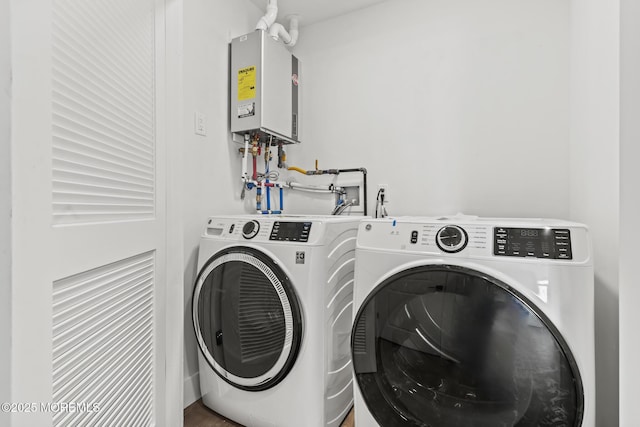 1010 Boulevard Blvd Unit 1E, Seaside Heights, NJ 08751 - laundry area with tankless water heater and washing machine and dryer