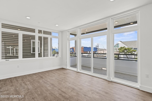 1010 Boulevard Blvd Unit 1E, Seaside Heights, NJ 08751 - unfurnished sunroom featuring wood finished floors and recessed lighting