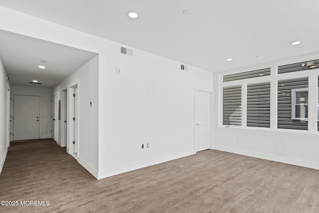 1010 Boulevard Blvd Unit 1E, Seaside Heights, NJ 08751 - empty room featuring wood finished floors and recessed lighting