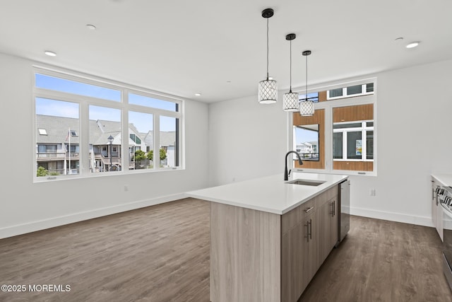 1010 Boulevard Blvd Unit 1E, Seaside Heights, NJ 08751 - kitchen featuring modern cabinets, dark wood-style flooring, light countertops, and an island with sink
