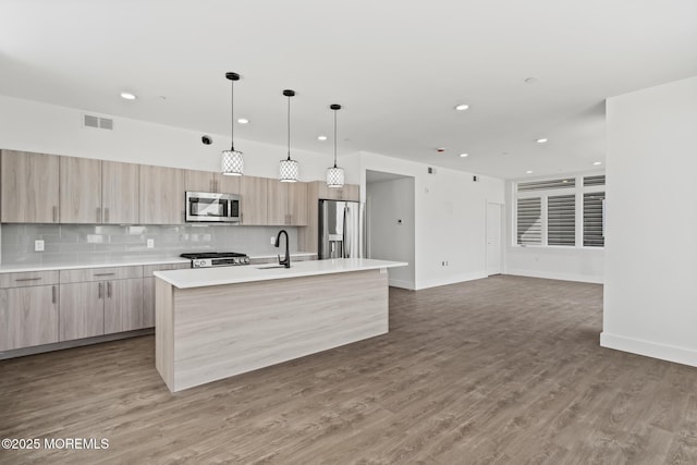 1010 Boulevard Blvd Unit 1E, Seaside Heights, NJ 08751 - kitchen with appliances with stainless steel finishes, light brown cabinets, modern cabinets, and recessed lighting