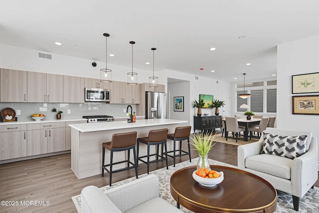 1010 Boulevard Blvd Unit 1E, Seaside Heights, NJ 08751 - living room with recessed lighting and light wood finished floors