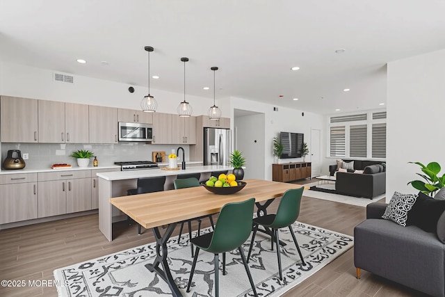 1010 Boulevard Blvd Unit 1E, Seaside Heights, NJ 08751 - dining space featuring light wood-style floors and recessed lighting