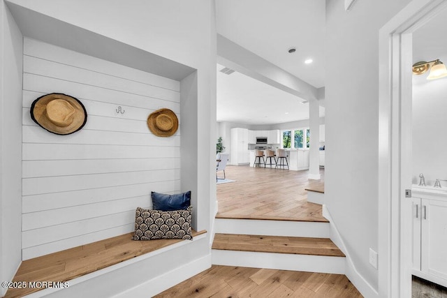 45 Shore Acres Ave, North Middletown, NJ 07748 - stairs with wood finished floors and recessed lighting