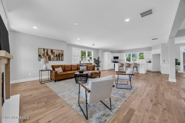 45 Shore Acres Ave, North Middletown, NJ 07748 - living room featuring light wood-style floors and recessed lighting